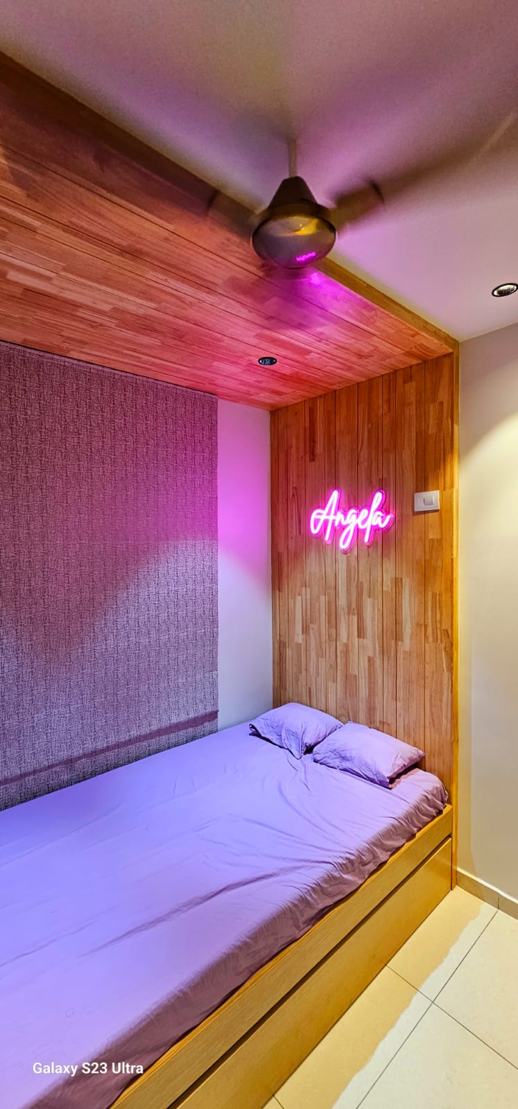 Teen bedroom platform bed with custom neon nameplate sign